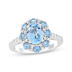 This exquisite and colorful blue topaz ring is one she'll want to wear always. Sterling silver A cool oval-cut Swiss blue topaz is the stunning focal point Round-cut Swiss blue topaz stones and white lab-created sapphires halo the center More white lab-created sapphires shimmer on the shank for all-over sparkle Light Blue Oval Diamond Topaz Ring, Fine Jewelry Light Blue Oval Topaz Ring, Dazzling Oval Blue Topaz Ring, Blue Oval Birthstone Ring With Diamond Accents, Oval Sapphire Topaz Ring With Diamond Accents, Oval Light Blue Topaz Ring, Dazzling Oval Topaz Ring, Light Blue Oval Topaz Ring, Oval Blue Topaz Ring With Diamond Accents