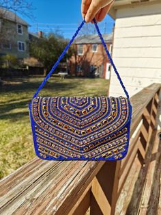 Handmade Blue Clutch Purse, Beaded Clutch Purse, Party Golden Purse, Blue Clutch, Glass Beaded Bag, Blue Beaded Handbag, Blue Box Bag, Blue Crossbody Bag The purse clutch is handmade and adorned with rhinestones and bead embroidery. This purse is stylish, flashy, and has a dazzled look. These purses/bags are for wedding functions, parties, and formal events, or you can use them as casual. These are fancy small bags ideal for money, cards, and makeup touchup kits. The bag has a single compartment Blue Sequin Evening Bags, Beaded Festival Clutch Bag, Beaded Clutch Bags For Festivals, Festival Beaded Clutch Bag, Beaded Pouch Shoulder Bag For Festive Occasions, Beaded Rectangular Clutch For Festivals, Festive Beaded Pouch Shoulder Bag, Blue Embroidered Clutch Shoulder Bag, Rectangular Beaded Clutch For Festivals