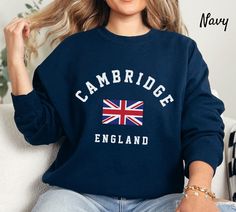 Cambridge Sweatshirt,  England Sweatshirt, UK Sweatshirt, Cambridge Unisex Heavy Blend Crewneck Sweatshirt Ideal for any situation, a unisex heavy blend crewneck sweatshirt is pure comfort. Garments are made from polyester and cotton. This combination helps designs come out looking fresh and beautiful. The collar is ribbed knit, so it retains its shape even after washing. There are no itchy side seams on these sweaters. - 50% Cotton 50% Polyester - Medium-heavy fabric (8.0 oz/yd² (271.25 g/m - C Uk Sweatshirt, University Shirt, Cambridge, Unisex Sweatshirt, Pretty Outfits, Crewneck Sweatshirt, Sweat Shirt, Ribbed Knit, Quality Fabric