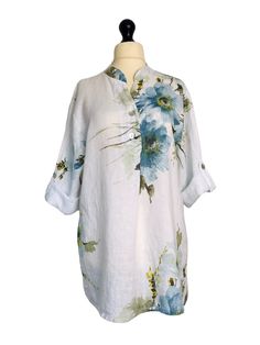 . Made from 100% linen in a pretty floral pattern , loose fitting tunic shirt style with short roll tab sleeves, button fastenings on the front neck and a single pleat detail on the bust . One size - to fit UK sizes 14 16 18 . Bust measures : 46 inches . Length from back of neck to bottom hem : 32 inches . Brand new with tags . Visit our shop for lots more gorgeous quirky lagenlook fashion !! Spring Linen Blouse With Floral Print, Vacation Linen Blouse With Floral Print, Short Sleeve Linen Blouse With Floral Print, Short Sleeve Linen Shirt With Floral Print, Summer Floral Print Shirt With 3/4 Sleeves, Linen Floral Print Blouse For Daywear, Daywear Linen Blouse With Floral Print, Linen Blouse With Floral Print For Daywear, White Linen Shirt With Floral Print