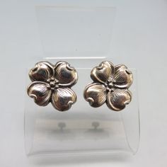 These lovely dogwood blossom vintage earrings are sterling screw back style. They measure 1 inch in diameter. They are in Excellent condition and signed, Sterling on the back. We will send these to you in a lovely gift box for safe storage or easy gift giving. If you like vintage costume jewelry, old silver, bolo ties and more, please check out my shop, www.etsy.com/shop/PANDPF Vintage Flower-shaped Earrings For Anniversary, Vintage Flower-shaped Pierced Earrings, Vintage Flower Shaped Earrings, Vintage Nickel-free Clip-on Earrings For Anniversary, Vintage Flower Shaped Clip-on Earrings, Vintage Flower Shaped Jewelry For Anniversary, Vintage Flower Shaped Nickel Free Earrings, Vintage Nickel-free Flower Earrings, Vintage Silver Flower Earrings