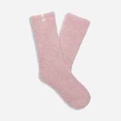 Cozy crew socks are for any season. Made from a soft knit with the perfect amount of stretch, they're great with boots or on their own. | Solid cozy crew sock. 99% Recycled Polyester/1% Elastane. 9 1/2 inch height. Soft twill tape with The UGG® Logo on top cuff. Sock size: 9-11. Fits shoe size: 5-10. Imported. | UGG® Women's Teddi Cozy Crew Sock Polyester Blend/Recycled Materials Socks in Ashen Rose Warm Casual Socks For Loungewear, Casual Warm Socks For Loungewear, Cozy Soft Socks For Fall, Soft Cozy Fall Socks, Cozy Warm Solid Color Socks, Super Soft Socks For Fall Loungewear, Casual Cozy Fit Socks For Loungewear, Cozy Super Soft Socks For Fall, Comfy Soft Socks For Fall