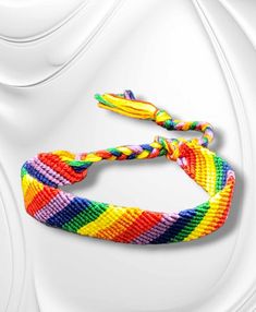 "Pride Friendship Bracelet": Let your true colors shine with this Pride Friendship Bracelet! Crafted with a rainbow of cheer, this bracelet comes with a sliding knot closure for easy on and off. Show your support for the community and wear it with pride! Bracelet has a sliding knot adjustable closure. . Adjustable Jewelry For Pride Festival Gift, Multicolor Pride Bracelets As A Gift, Multicolor Bracelets For Pride Gift, Multicolor Pride Bracelets For Gift, Multicolor Bracelets For Pride, Rainbow Sliding Knot Bracelet, Trendy Jewelry For Pride Gifts, Rainbow Sliding Knot Bracelets For Friendship, Rainbow Sliding Knot Bracelet For Friendship