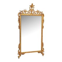 an ornate gold framed mirror against a white background