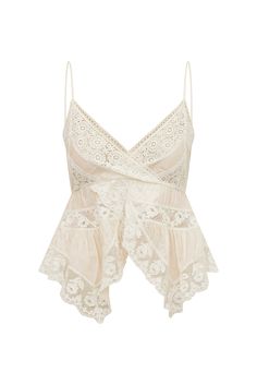 Loving on the Luschia Top. Designed from a silky viscose habotai fabric, this vintage-inspired top is all in the details with a stunning medley mix of laces and shirring details all over. This sexy cami top has an overlapping, sweepy peplum and handkerchief silhouette. Delicate, floral laces arrive at the sweep and the bodice. The evening-to-day top includes a zipper for functionality. Girly Tops, Vintage Cami, Blusas Top, Lace Cami Top, White Lace Top, Lace Cami, Dream Clothes, Cami Top, Lace Tops