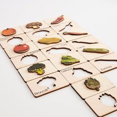 a collection of broccoli and other vegetables on wooden boards