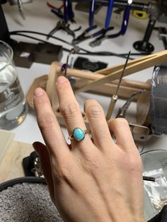 Simple American Mined blue turquoise set on 14k yellow gold. Solid 14k yellow gold fully hallmarked. 1.4mm band width. 8mmX 10mm Genuine North American turquoise. All of our jewelry will arrive in custom packaging ready for gift giving. LEAD TIME: Made to order will take 10-14 days. FOLLOW US ON: Instagram: @roseandchoc Facebook: /Roseandchoc Pinterest: @Roseandchoc Oval Turquoise Cabochon Ring In Yellow Gold, Oval Yellow Gold Turquoise Ring With Cabochon, Sterling Silver Turquoise Ring In Yellow Gold, Sterling Silver Turquoise Ring With Yellow Gold Gemstone, Turquoise Gemstone Ring In Yellow Gold Sterling Silver, Fine Jewelry Turquoise Oval Cabochon Ring, Handmade Turquoise Ring In Yellow Gold, Handmade Yellow Gold Turquoise Ring, 14k Gold Turquoise Oval Rings