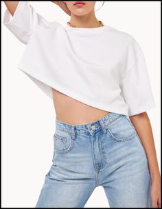 Embrace casual sophistication with the Hunter Tee, a contemporary take on the classic T-shirt. This top features a comfortable round neckline and a relaxed, boxy fit that exudes modern style. The cropped length is perfect for pairing with high-waisted jeans or skirts, while the elbow-length sleeves add a touch of elegance to the casual cut. Key Features: Round Neckline: A classic touch that frames the face. Boxy Fit: Offers a contemporary silhouette with plenty of comfort. Cropped Length: Stylish and perfect for layering or wearing alone. Elbow-Length Sleeves: Provides coverage with a fashionable edge. Fabric Composition: Cotton, Polyester, Spandex | Contrast - Polyester, Spandex With its unique blend of comfort and on-trend details, the Hunter Tee is an essential piece for those who appre Relaxed Fit Cropped T-shirt For Summer, Boxy Cropped T-shirt For Streetwear, Casual Cropped T-shirt For Streetwear, Trendy Boxy Cropped T-shirt For Streetwear, Trendy Boxy Cropped T-shirt For Summer, Trendy Oversized Cropped T-shirt For Summer, Chic Crew Neck Cropped T-shirt For Summer, Boxy Cropped T-shirt For Summer Streetwear, Basic Crew Neck Crop Top With Relaxed Fit