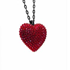 Handcrafted with care in Cleveland, this mini heart pendant is encrusted with 200+ sparkling crystals applied by hand, creating a dazzling and luxurious accessory. The miniature size makes it perfect for layering or wearing on its own, adding a touch of glamour to any outfit. DETAILS Heart Charm: 1.5" wide Chain: 16" chain + 2" extender Made to order. Please allow 2-3 weeks for delivery. SIZE CHART Gothic Necklaces, Scene Jewelry, Red Studs, Beautiful Red Hair, Red Accessories, Studded Necklace, Scene Fashion, Gothic Necklace, Punk Jewelry