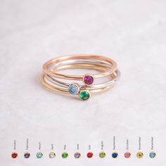 14K 18K Solid Gold Stacking Band Ring with Birthstones, Custom Simple Band Ring is Available Single Double or Triple, Perfect Gift For Women Material: Solid Gold (not gold filled or not gold plated) Available gold karat: 14 K (585) or 18 K (750) Available gold color: Yellow, rose, white The width of this ring is approx 1.1 mm Stone Size: 2.7mm Multi-stone Round Jewelry For May Birthstone, Gold Multi-stone Jewelry For May Birthstone, Adjustable Gold Stackable Rings With Multi-stone, Adjustable Gold Multi-stone Stackable Rings, Yellow Gold Sterling Silver Birthstone Ring With Round Stone, May Birthstone Stackable Round Stone Jewelry, Adjustable Ruby Birthstone Ring In Fine Jewelry Style, Stackable Round May Birthstone Jewelry, Stackable May Birthstone Jewelry With Round Stones