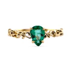 Genuine Emerald Ring/ 14K Gold Pear Cut Emerald Wedding Ring/ Filigree Engagement Ring/ Art Deco Ring/ May Birthstone Ring/ Sushila Jewelry ≫ Features * Items Code: SGR02638_47807 >> Metal Details:-  * Metal: 14K Solid Gold (10K & 18K also available - Additional fees may apply) * More options in gold color: Rose gold, Yellow gold, White gold * Emerald Wt: 0.61 ct. * Gemstone Cut:- Pear Cut * Ring Size: 3 to 10 (All sizes available) ≫ FAQ below for more detail. ✦ Sizing  We can adjust most items to fit your sizing preferences. Most items can be made to any size and length. Please leave a note at checkout or contact us via Etsy conversation.  Even after purchasing the item, you can still ask us to adjust the size or length. We will try our best to fix it if it is possible. ✦ Custom Orders Si Heirloom Yellow Gold Pear-shaped Ring, Heirloom Yellow Gold Pear Shaped Ring, Fine Jewelry Emerald Ring With Intricate Design For Wedding, Emerald Rings With Intricate Design For Anniversary, Teardrop Emerald Wedding Ring In 14k Gold, Yellow Gold Emerald Ring With Intricate Design, Wedding Emerald Ring With Intricate Design, Emerald Rings With Intricate Design For Wedding, Gold Filigree Ring With Accent Stones For Wedding