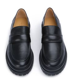 Stand-out from the crowd with our Wiz loafer. Showcasing a classic black leather exterior, this design features an exaggerated chunky sole with a sleek rounded toe-shape, a high-cut vamp and is finished with a leather upper, lining and cushioned foot-bed. -Material: Leather Upper & Lining -Sole: Man-Made -Fit: We recommend choosing a half size down -Toe-shape: Rounded -Features: Chunky sole -Heel: 4.5cm Leather Chunky Platform Slip-on Loafers, Modern Chunky Platform Loafers, Classic Leather Platform Loafers With Chunky Platform, Modern Black Platform Loafers With Chunky Sole, Modern Black Platform Loafers With Chunky Platform, Modern Leather Platform Loafers With Chunky Platform, Modern Platform Loafers With Chunky Platform For Office, Leather Platform Loafers For Office, Modern Chunky Platform Loafers For Office