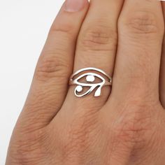 Egyptian Eye of Horus ring in 925 sterling silver. Available in sizes 6, 7, 8 and 9. ♥ FREQUENTLY BOUGHT TOGETHER ♥ - Sterling Silver Polishing Cloth: https://etsy.me/3ieXQyh Looking for more sterling silver jewery? Check out our collection: https://charmphilosophy.etsy.com ♥ PACKAGING ♥ Our rings come in a jewelry box with a jewelry card background. If you would like a custom message included on the jewelry card background, please tell us in the GIFT MESSAGE when you pay.  ♥ SHIPPING INFO ♥ We Silver Symbolic Midi Rings, Symbolic Silver Hypoallergenic Jewelry, Symbolic White Sterling Silver Rings, Nickel Free Symbolic Open Ring Jewelry, Silver Symbolic Midi Rings In Sterling Silver, Silver Symbolic Midi Rings For Wedding, Symbolic Silver Hypoallergenic Rings, Symbolic Silver Midi Rings In Sterling Silver, Symbolic Silver Sterling Midi Rings