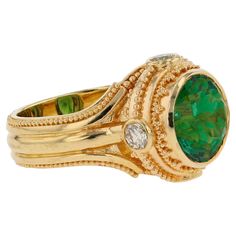 From the Kent Raible limited edition 'Studio Collection', this ring boasts a bold, unique and striking design which showcases the deep rich Green Tourmaline cut specifically for this ring design. Accented with the clean bright sparkle of diamonds, Kent calls this his 'Prayer Wheel Ring', because of the wheel like feeling of this powerful design. Green Tourmaline 3.97ct Diamonds GVS/SI .48ct 11.6 grams 18k Gold Size 6.5 This ring is sizable This item can be made in a similar fashion with the gems Luxury Collectible Rings With Bezel Setting, Luxury Green Collectible Rings, Lingot D'or, Prayer Wheel, Bridal Jewels, Vintage Cocktail Ring, Diamond Cocktail Rings, Rich Green, Art Deco Diamond