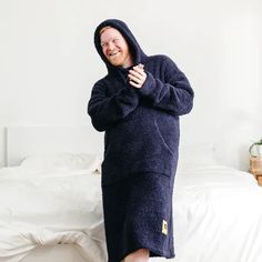 Feel like you’re wrapped in a cloud when you slip on the Premier Plush™ Hoodie, our newest wearable blanket in breathable, all-seasons fabric. This generously sized hoodie is ultra-plush and includes cozy extras like a built-in eye mask, oversized kangaroo pouch, sleeves with thumb holes, and extra length so you're swimming in snuggles. Wearable Blanket, Kangaroo Pouch, Thumb Holes, Getting Cozy, Black Hoodie, Kangaroo, Eye Mask, Like You, Built In