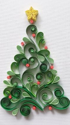 a christmas tree made out of green paper