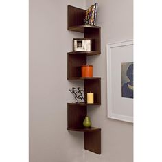 the corner shelf is made out of wood and has three shelves on each side, one with