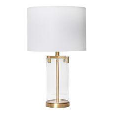 PRICES MAY VARY. This industrial-inspired table lamp showcases a cylindrical bubble glass base with brushed gold metal accents, topped with a linen drum shade Expertly crafted with a stunning mix of materials and textures, this piece will bring warmth and serenity to a space of any style from minimalist to transitional with ambient diffused light Equipped with a rotary switch Maximum 60W bulb not included Lamp measures 15 inches L x 15 inches W x 26.5 inches H Gold Glass Lamp, Metal Room, Nightstand Light, Big Room, Lamp Gold, Metal Table Lamp, Gold Lamp, Gold Table Lamp, Room Stuff