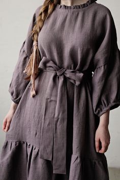 This oversized dress is made from 100% soft and washed linen. Details: - Composition: 100% Oeko-Tex certified linen - Colour: mauve - Dropped shoulders - Linen belt - Ruffle skirt and neckline - Size: One size - fits all - Medium weight linen - Linen care: machine wash gentle; tumble dry low, ironing optional - The price is for one dress, other pictured items are not included Measurements: Length (from neck down) - 125 cm (49,2 in) Chest width - 140 cm (55,1 in) Sleeve length (from collar) - 60 Flowy Linen Dress For Brunch, Relaxed Fit Linen Ruffle Dress, Relaxed Fit Linen Dress With Ruffles, Victorian Aprons, Plus Size Linen Dress, Linen Belt, Victorian Maid, Pink Linen Dress, Kimono Style Dress