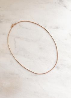 Dainty gold snake chain choker necklace basic yet stylish: it can be layered with other chokers or necklaces. -------------------- DETAILS ・1 mm 18K gold filled snake chain ------------------- SIZE This choker is 13.5" long. -------------------- SHIPPING ・All of orders are shipped via USPS, each package comes with tracking number. ・There is no extra shipping cost for additional items. ・Delivery takes 2 - 5 business days ( for domestic delivery ) ------------------- PROCESSING TIME ・Please allow Choker Necklace Gold, Dainty Chain Necklace, Gold Snake Chain, Necklace Layering, Dainty Chain, Gold Choker Necklace, Delicate Chain, Gold Snake, Chain Choker Necklace