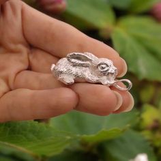 PLEASE NOTE - this pendant is Made-To-Order and takes 3-5 weeks to make. 🌿 Calling all Nature Enthusiasts and Animal Lovers! 🍃 🍃 Introducing the Highly Detailed Sterling Silver Rabbit Necklace : This rabbit pendant makes unique and meaningful gift any nature of animal lover 🍃 📏 Specifications: *Length: 3.5cm *Width: 1.7cm *Weight: 20 grams of Solid Sterling Silver 💎 🍃 Crafted with Love: This is an original piece, handcrafted with passion. I design, sculpt, mould, and hand finish my pieces Handmade Silver Jewelry For Gift, Rabbit Necklace, Rabbit Jewelry, Rabbit Necklaces, Rabbit Pendant, Lucky Rabbit, Rabbit Lover, Cute Rabbit, Gift Cute