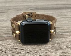 Gold Apple Watch Band 38mm 40mm 42mm 44mm. Double Strapped 7mm Rustic Brown Leather Straps with Adjustable Buckles. Gorgeous Design Bracelet Tailored to Perfection. Designed And Handmade by Simeon D Jewelry Studio. This Bracelet Fits ALL Apple Watch Series. Please Measure Your Wrist Before Submitting Your Order! Not For Other Models. Apple Watch Is NOT Included. Let's be Friends! Follow my Studio on Social Media Instagram @simeondjewelry Pinterest @simeondjewelry Facebook @simeondjewelrystudio Gold Leather Apple Watch Band With Bracelet Strap, Gold Rectangular Leather Strap Apple Watch Band, Adjustable Gold Leather Watch Bands, Gold Rectangular Leather Apple Watch Band, Gold Rectangular Apple Watch Band With Leather Strap, Gold Leather Strap Apple Watch Band, Gold Leather Apple Watch Band, Adjustable Gold Leather Apple Watch Band, Gold Apple Watch Band