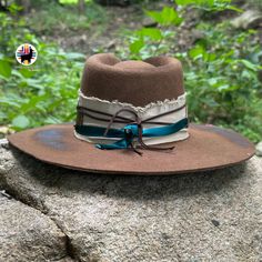 ITEM DESCRIPTION Indian Creations brings the adventure to you with its water-repellent, wool-felt, unisex outback hat. Your next week-long camping trip is sure to offer plenty of opportunity for you to show off the new fashionista in you. These hats are the perfect complement to your outfit. Our hats are proudly handcrafted by Indigenous hands.   HOW TO MEASURE HEAD SIZE? To measure your head circumference for hat sizing, use a flexible measuring tape or string, wrap it around your head above yo Country Style Brimmed Felt Hat For Outdoor, Country Style Wool Hat For Outdoor, Adventure Wide Brim Brown Hat, Western Felt Hat With Curved Brim For Outdoor, Western Felt Hat With Curved Brim For Outdoor Activities, Country Style Fur Felt Hat For Outdoor Use, Bohemian Brown Hat For Outdoor, Country Style Felt Hat With Flat Brim For Outdoor, Brown Country Style Felt Hat For Outdoor