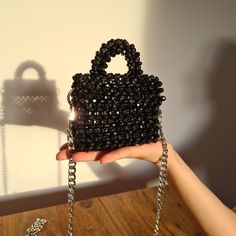 ✨Black Crystal Beaded Bag ✨Dimensions: 11х13х5 cm ✨Shoulder Strap Length: 116 cm | 100% handmade. Crystal beads are much heavier than acrylic beads. That's why it's reasonable to make them smaller, so it is easy to carry. The weight of this particular model is 510 gram included a long shoulder strap. This bag can hold credit cards, small lipstick, small bottle of perfume, keys and AirPods.  https://larisatoshop.etsy.com Black Handheld Beaded Shoulder Bag, Black Beaded Handheld Shoulder Bag, Black Beaded Evening Bag As Gift, Black Beaded Evening Bag For Gift, Black Beaded Square Shoulder Bag, Rectangular Bag With Black Beads As Fashion Accessory, Handmade Black Party Bag, Party Black Box Bag With Mobile Phone Holder, Gift Black Beaded Shoulder Bag