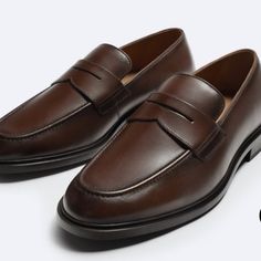 Loafers. Made Of Leather. Welt Around Upper. Ornamental Saddle Detail At Instep. Tonal Soles. Semi-formal Slip-on Round Toe Moccasins, Brown Closed Toe Moccasins For Semi-formal Occasions, Business Moccasins With Brogue Detailing And Flat Heel, Business Flat Heel Moccasins With Brogue Detailing, Elegant Wingtip Slip-ons For Office, Semi-formal Slip-on Dress Shoes With Flat Heel, Classic Semi-formal Slip-ons For Spring, Business Loafers With Brogue Detailing And Flat Heel, Semi-formal Leather Sole Loafers With Round Toe