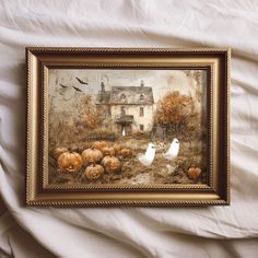 a painting of two white birds and pumpkins in front of a house on a bed