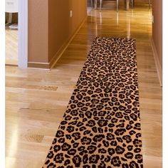 a leopard print rug is on the floor