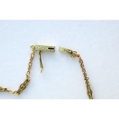 This is part of Chairish’s Fine Jewelry assortment.  A beautiful, elegant, detailed, strong, and well-made choker necklace in 14-karat yellow gold, circa mid to late-20th century. Necklace has beautiful, detailed chain links and detailed bar clasp. A chic vintage piece to wear alone or stack with other necklaces, dress up or down. Very good condition as shown in images. No issues. Marked '14k' on clasp. A true choker necklace measuring: 13.88" long.  Emerald stud earrings (in ear) are also avail Formal Yellow Gold Chain Necklace With Gold Clasp, Classic Yellow Gold Necklace With Gold Clasp, Antique Formal Jewelry With Gold Clasp, Vintage 14k Gold Necklace With Adjustable Chain, Timeless Formal Chain Necklace With Lobster Clasp, Formal Yellow Gold Chain Necklace With Spring Ring Clasp, Formal Adjustable Brass Chain Necklace, Elegant Brass Jewelry With Figaro Chain, Gold-tone Necklaces With Gold Clasp For Formal Occasions