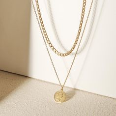 Sku: NSSN696STGC Details: The golden coin layered necklace is full of many simple details, and we simply cannot get enough details. This gold layered necklace has two lines-one with the most perfect pendant, and the other with a little design, adding some extra things. The layered coin necklace creates a beautiful layered look in just one step. Stainless Steel 316L features: With its resistance to rust and oxidation, this corrosion-resistant alloy is ideal for long-lasting jewelry designs. This Layered Coin Necklace, Gold Layered Necklace, Golden Coin, Stacked Necklaces, Multi Layer Necklace, Ring Stack, Little Designs, Gold Necklace Layered, Simple Beauty