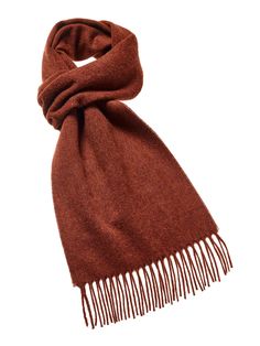 "The ultimate fashion statement, the Plain Luxury Scarf is the perfect accessory to compliment or enhance an Autumn, Winter or Spring outfit. A soft, warm and elegant scarf made from 100% Pure Merino Lambswool. Our Plain Luxury Scarves are available in a wide variety of colors which can either contrast or match your outfits. Seen here in Plain Rust Approx size incl. fringe 10\" x 75\" (w x l) This product is manufactured by Abraham Moon & Sons Ltd who have been producing quality wool product Elegant Luxury Merino Wool Scarves, Luxury Elegant Merino Wool Scarves, Rust Colored Shawl, Casual Brown Scarves, Luxury Brown Bohemian Scarf, Luxury Fringe Scarves For Fall, Luxury Brown Elegant Scarves, Luxury Brown Pashmina Scarf, Luxury Brown Scarves For Women