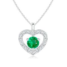 At the center of a glistening diamond studded heart frame is a prong set emerald that enthralls with its lush green hue. This simple yet stunning solitaire emerald open heart pendant is designed in 14k white gold. Heart Pendant Gold, Heart Frame, Emerald Pendant, Open Heart, Fine Jewellery Necklace, Lush Green, Diamond Studs, Heart Pendant, Lush