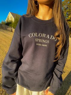 Take a little vacation to Colorado Springs with this crewneck sweatshirt. This sweatshirt features long sleeves, a crew neckline, and beautiful front embroidery. The Unisex Sizing makes the sweatshirt run slightly larger than your average sweatshirt for women. Most men find their normal size to be more snug. If you want a slightly looser fit, size up one size. Please check out our size chart for measurements to ensure an accurate fit. PLEASE BE SURE TO INPUT YOUR CORRECT SIZE/COLOR + SHIPPING AD Crewneck Sweatshirt Women, Everyday Fashion Outfits, Sweatshirt For Women, Colorado Springs, Comfy Outfits, Crew Neckline, Everyday Fashion, Crewneck Sweatshirt, Sweatshirts Women