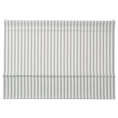 a white and grey striped roman blind