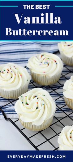 vanilla buttercream cupcakes on a cooling rack