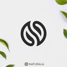 the logo for naturala is surrounded by green leaves