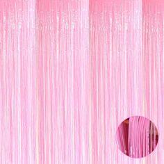 a pink curtain with a circular hole in the center