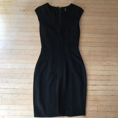 Super Cute And Great Quality Black Mini Dress From H&M. Brand New, Never Worn, But No Tags. Perfect For Wearing To A Professional Job Or A Formal Occasion! H&m V-neck Dress For Formal Occasions, H&m Black V-neck Mini Dress, H&m V-neck Formal Dress, H&m Formal V-neck Dress, H&m Black Sleeveless Dress, Black Office Dress With Back Zipper, H&m Mini Dress For Work, H&m Black Short Sleeve Mini Dress, Elegant H&m Midi Dress For Work