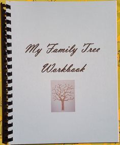 a family tree workbook on a yellow and white background with the words, my family tree workbook