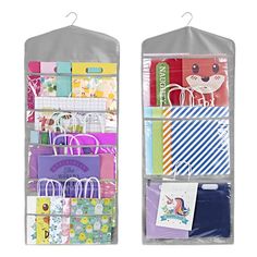 two hanging storage bags filled with lots of different types of cards and paper goods in them