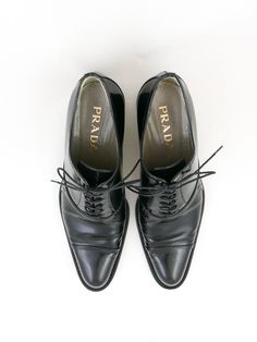 Perfect lace up leather oxford/ brogue shoes with slight point and 1 1/2” heel. No box. Made in ItalySize 7.5 (IT 38) women’sEra: 1990's 10 3/8”(inside) x 3 1/2”(outside) Condition: Good. Some visible wear (see photos). Classic Snip Toe Oxfords For Office, Designer Oxfords With Brogue Detailing And Almond Toe, Designer Cap Toe Oxfords With Brogue Detailing, Classic Oxford Shoes With Pointed Toe, Designer Brogue Detailed Oxfords For Formal Wear, Designer Wingtip Oxfords For Work, Designer Brogue Oxfords For Formal Occasions, Semi-formal Pointed Toe Oxfords With Branded Insole, Designer Wingtip Oxfords For Formal Occasions