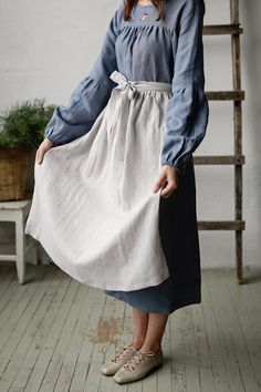 "Apple apron is made from 100% soft and washed linen.  Details: - Colour: Fog grey - Composition: 100% Oeko-Tex certified linen - Size: One size - Medium weight linen - Linen care: machine wash gentle; tumble dry low, ironing optional - The price is for one apron, other pictured items are not included The model is 170 cm/5'7\" and wears a size one size." Apple Apron, Cottagecore Apron, Cottagecore Shorts, Style Language, Hobbit Costume, Apron Skirt, Cottagecore Outfit, Apron For Women, Sewing Easy Diy