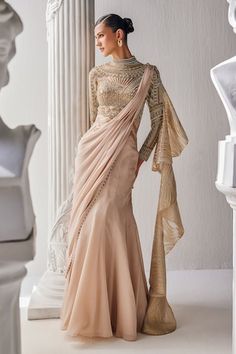 Golden cream pre-draped saree gown in shimmer chiffon base with a zardozi embroidered yoke and high neckline. - Aza Fashions Floral Work Blouse, Draped Saree Gown, Saree Gowns, Draped Saree, Cotton Saree Designs, Fancy Sarees Party Wear, High Fashion Dresses, Gown For Women, Saree Gown