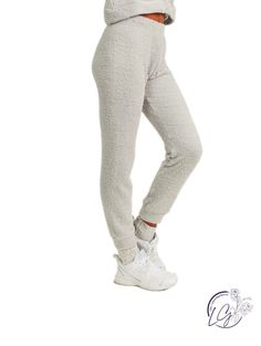 The Warm Embrace Joggers are the epitome of cozy comfort. These jogger pants are designed to provide warmth and softness, making them perfect for chilly days or relaxed evenings at home. The Warm Embrace Joggers are lined with a soft and plush fleece material on the inside, providing an extra layer of warmth and coziness. This lining envelops you in a gentle embrace, keeping you snug and comfortable even on colder days. Machine wash cold (Gentle cycle), Tumble dry low or Hang Dry (recommended).H Curvy Shorts, Head Wrap Headband, Curvy Jeans, Sweater Tank Top, Athletic Pants, Skirt Leggings, Comforters Cozy, Long Blouse, Sweater Blouse