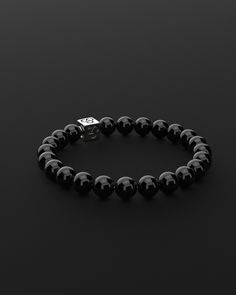 Experience simplicity at its finest with the Essential Bracelet. This piece embodies the elegance of minimalism, crafted for those who find beauty in understatement. It's a subtle yet powerful expression of self, perfect for visionaries who appreciate the grace in simplicity and make their mark with a quiet yet impactful presence. All our stones are chosen by hand to satisfy AAA quality standards. They are natural stones and their size and color can vary slightly. Stone: AAA Grade 8mm Metal: 925 Modern Adjustable White Gold Beaded Bracelets, Sleek Sterling Silver Jewelry For Formal Occasions, Luxury Everyday Sterling Silver Bracelet In White Gold, Modern Silver Bracelets For Everyday Luxury, Luxury Sterling Silver Round Bead Bracelets, Elegant Bracelets With 8mm Beads As A Gift, Luxury Sterling Silver Bracelet For Everyday, Classic Adjustable Sterling Silver Stretch Bracelet, Modern Adjustable Pearl Bracelet