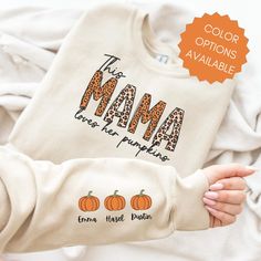 Mama loves her pumpkins kids names on sleeve sweatshirt, Pumpkin Fall Shirt, Thanksgiving Tee, Cute Fall Shirt, Women's Graphic shirt Customizable Long Sleeve Family Matching Sweatshirt, Customizable Cute Long Sleeve Top, Cute Customizable Long Sleeve Top, Fall Sweatshirt With Name Print And Long Sleeves, Customizable Cute Tops For Fall, Customizable Cotton Fall Sweater, Customizable Cotton Sweater For Fall, Cute Name Print Tops For Fall, Cute Tops With Name Print For Fall