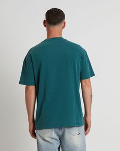 The Atom T-Shirt by Insight comes in a pine green colourway. The tee features a ribbed crew neck, signature branding at centre chest, premium cotton fabrication, short sleeves and a straight hem. Style it with track shorts and sneakers for a laidback look.Our model is wearing a size large. He is 183cm tall with a 96m chest and a 76cm waist. Teen Shopping, Destination Dress, Track Shorts, Skirt Jumpsuit, Pine Green, Hem Style, Jersey Top, Skirted Swimwear, Denim Shop